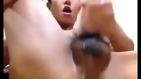 Asian person shows chink and jerks his cock